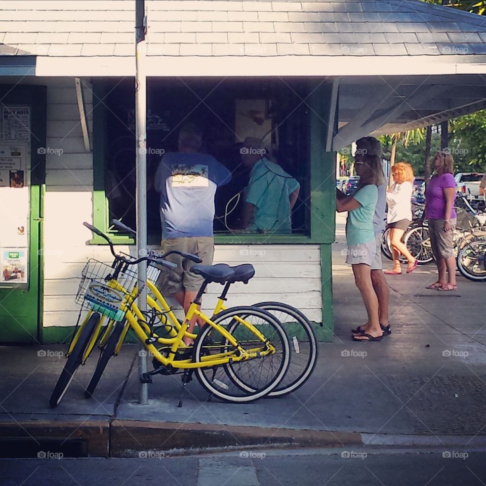 Yellow Bicycles. spotted these bright bikes outside of a walk-up bar in Key West FL