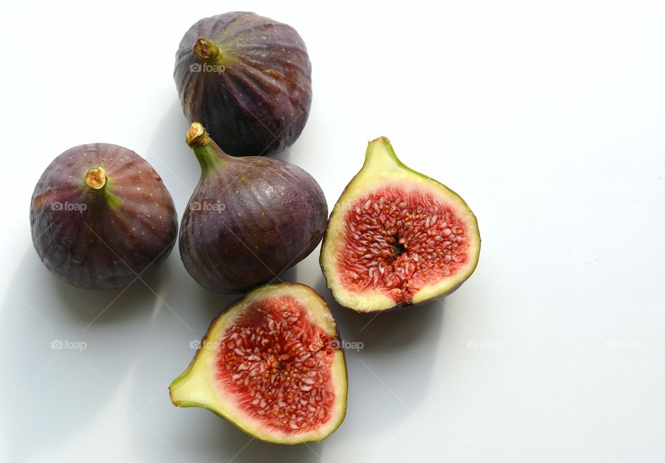 fresh figs on a white background tasty healthy summer food