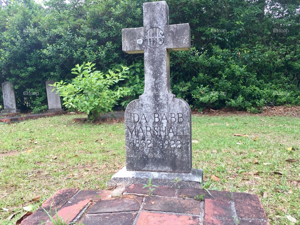 Old headstone grave site in a cemetery 
