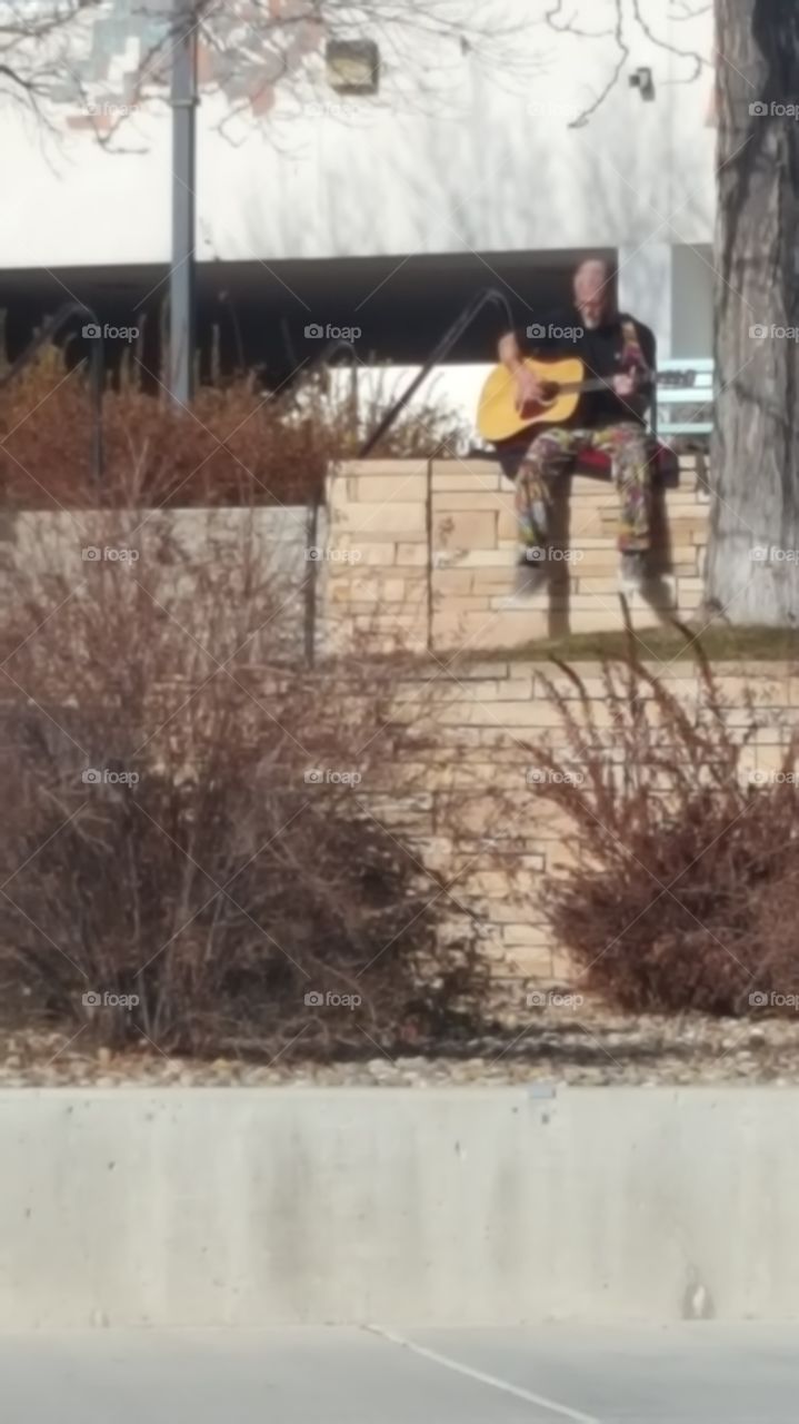 guy playing guitar
