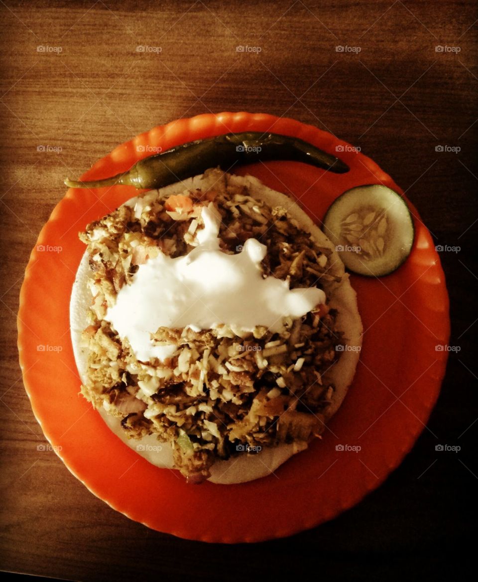 Arabian food available in india, kerala. it's name  is chicken shawarma, it's taste is so yummy and Spice, lovable.