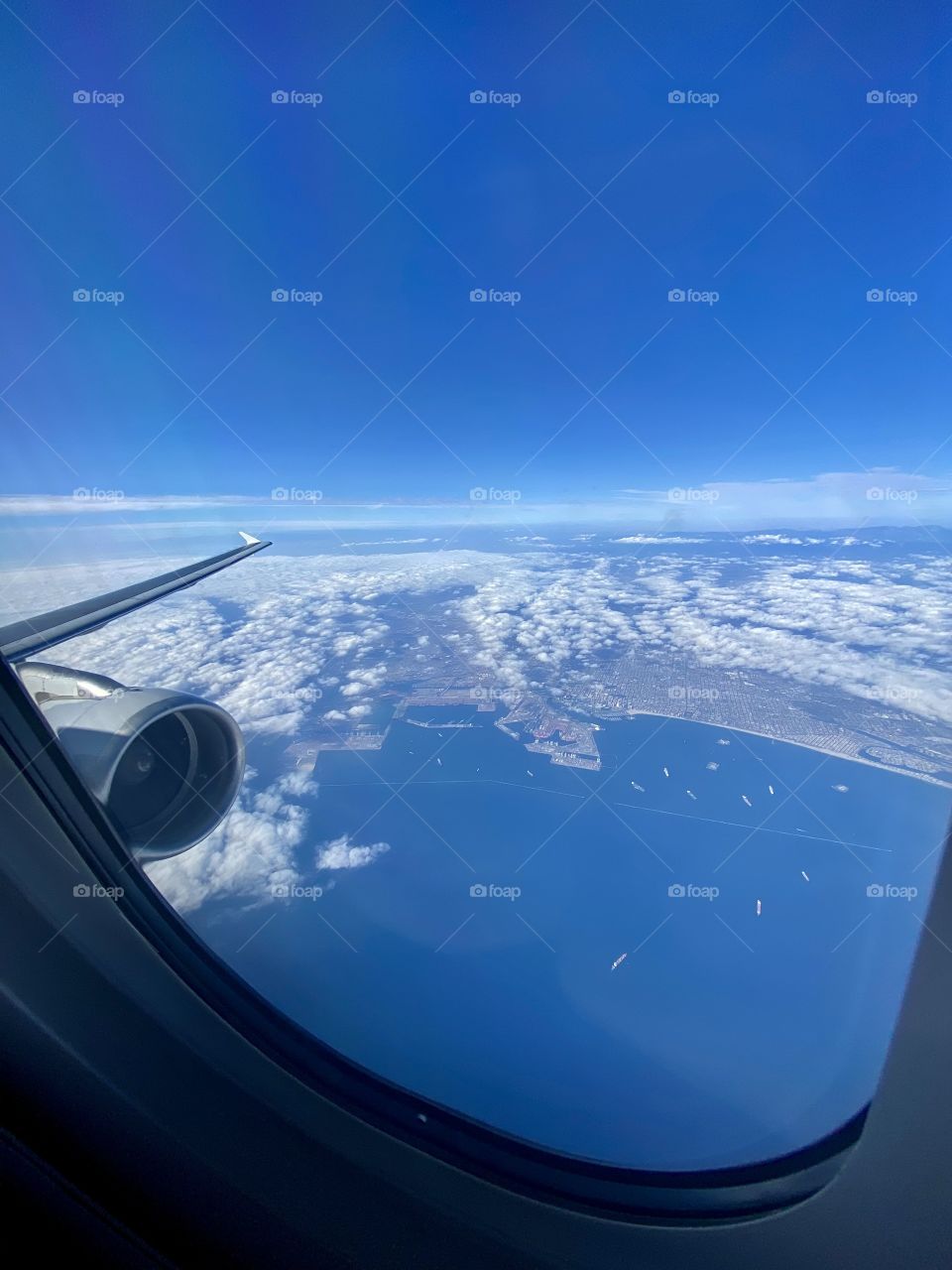 American Airlines Airbus A321 flying over the Port of Long Beach after taking off from Los Angeles International Airport (LAX)