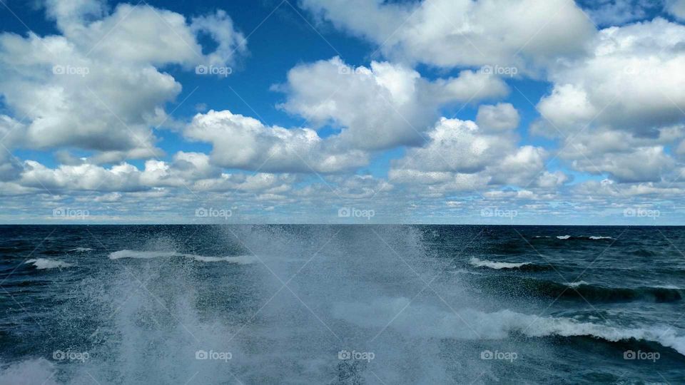 Blue sky, Water and White spray
