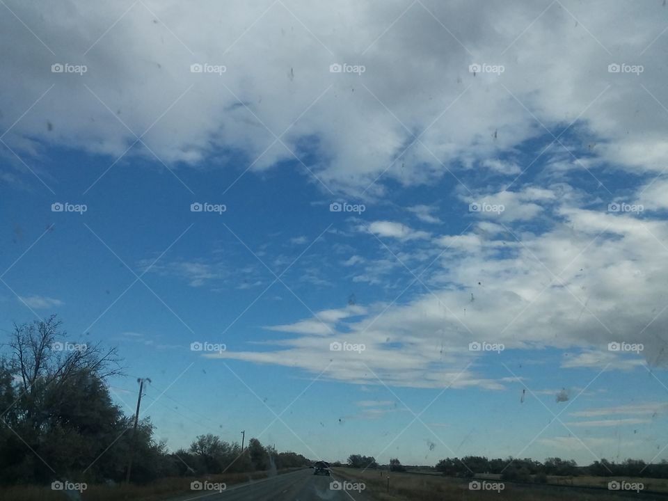 Beautiful Sky with traveling clouds