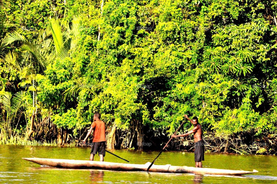 --Asmat: Traditional boat....