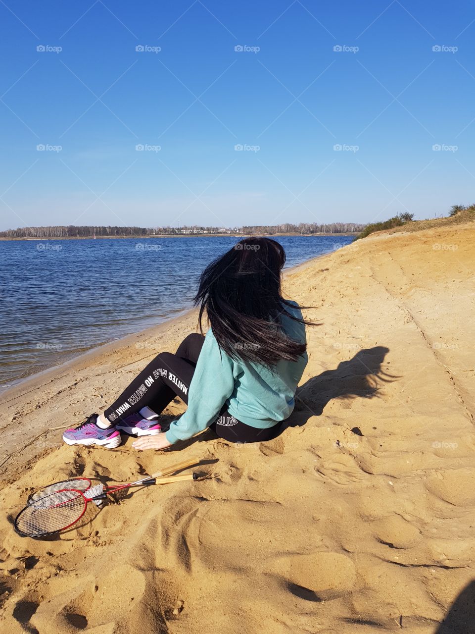 girl with black hair on the shore 5