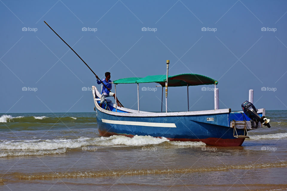 fisherman with his boat