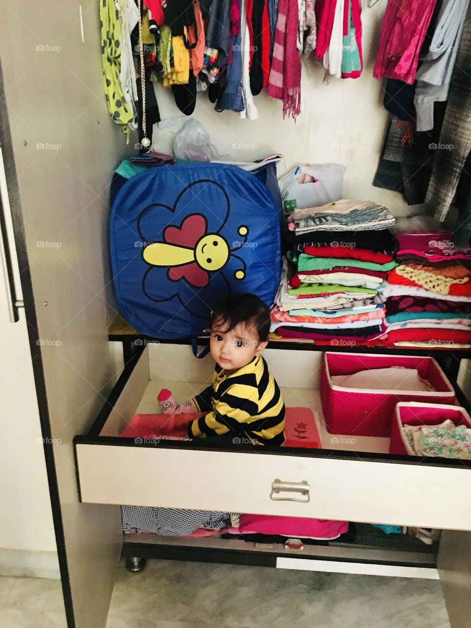 "Who needs a crib when a drawer makes the perfect spot for mischief and cozy naps?"