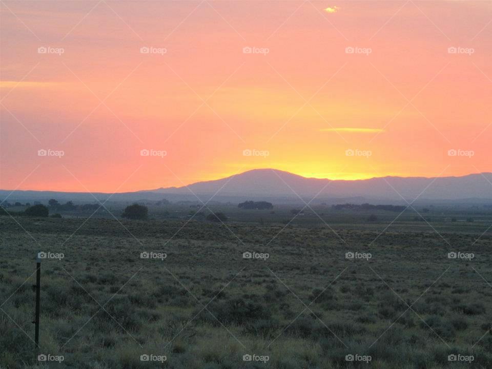 Sunset & smoke from distant grass fires