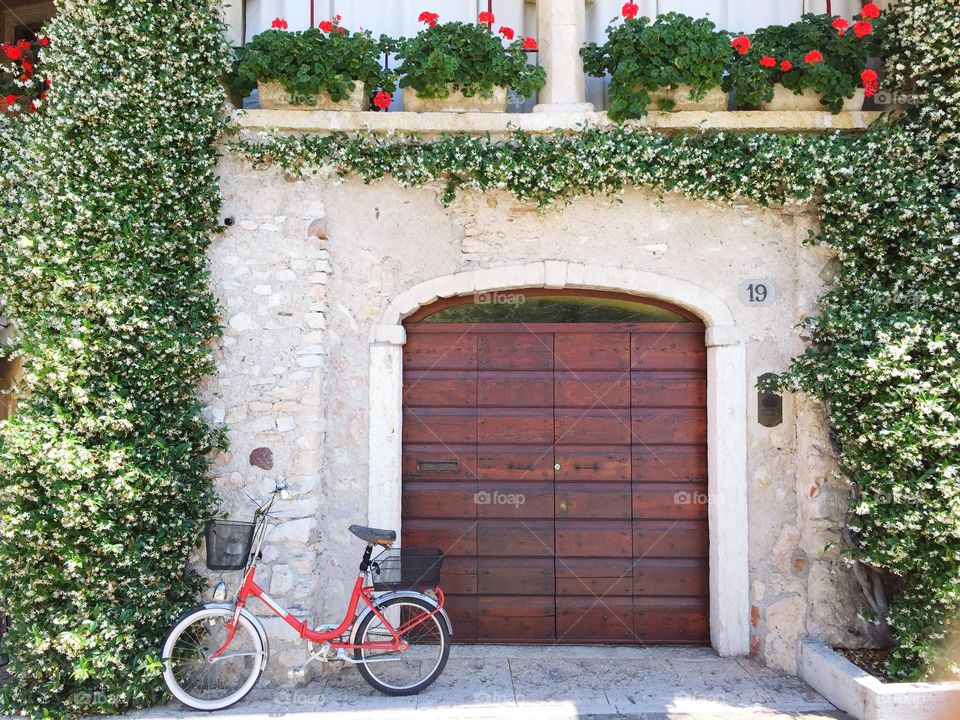 Wooden door with bicycle 