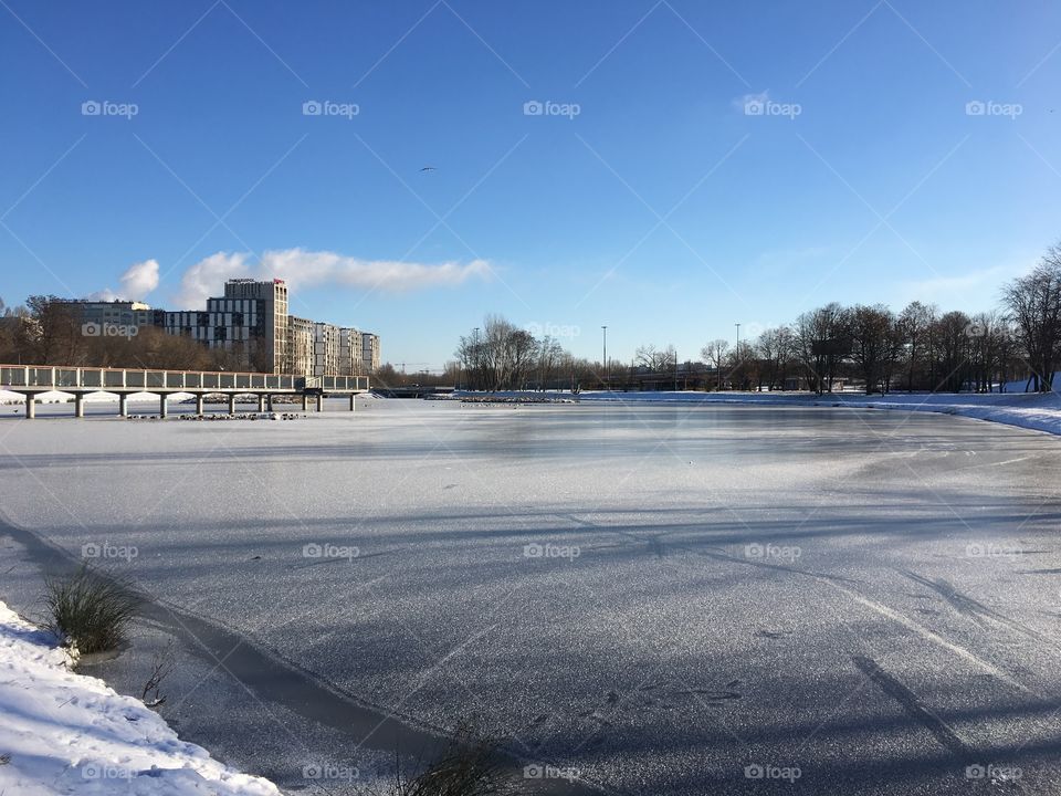 Frozen lake in the city center