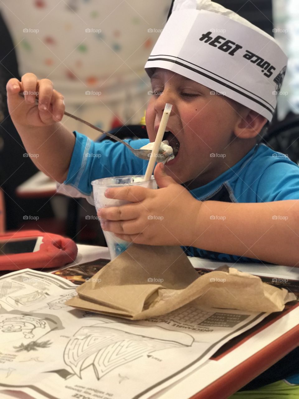Close-up of a boy eating ice-cream