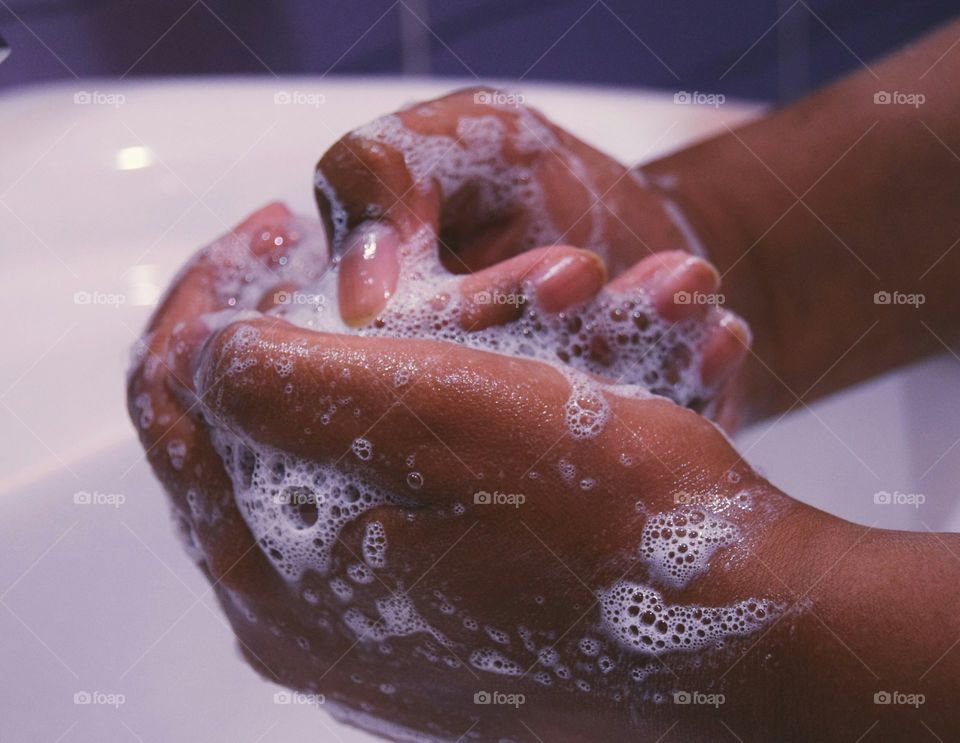 Close-up of a person washing hand