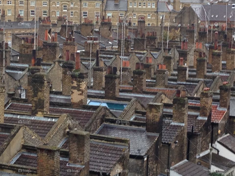 Rooftop view of working class terrace houses and chimneys in rows