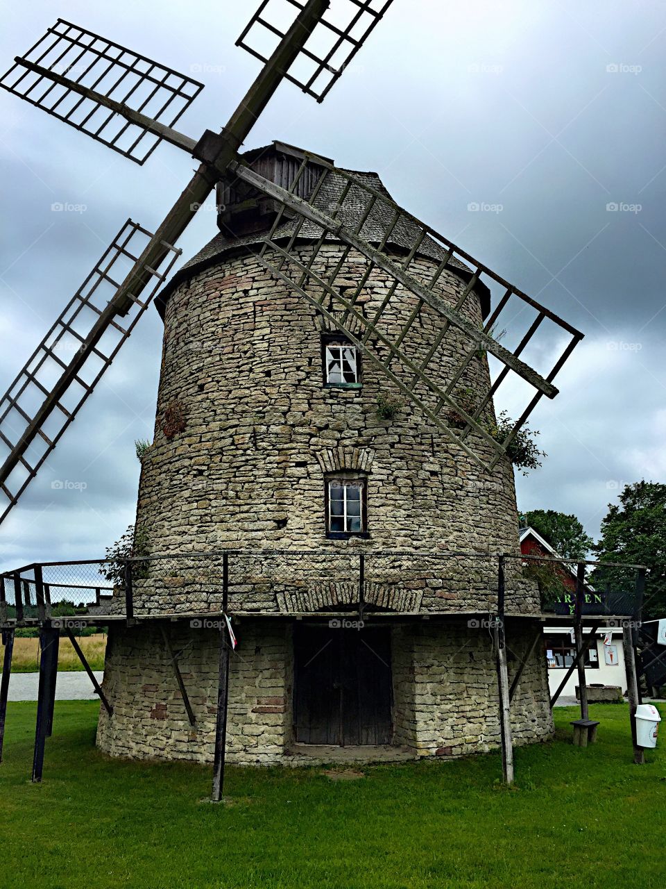 View of windmill against cloudy sky