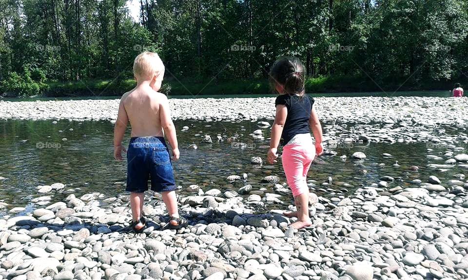 toddlers at the river