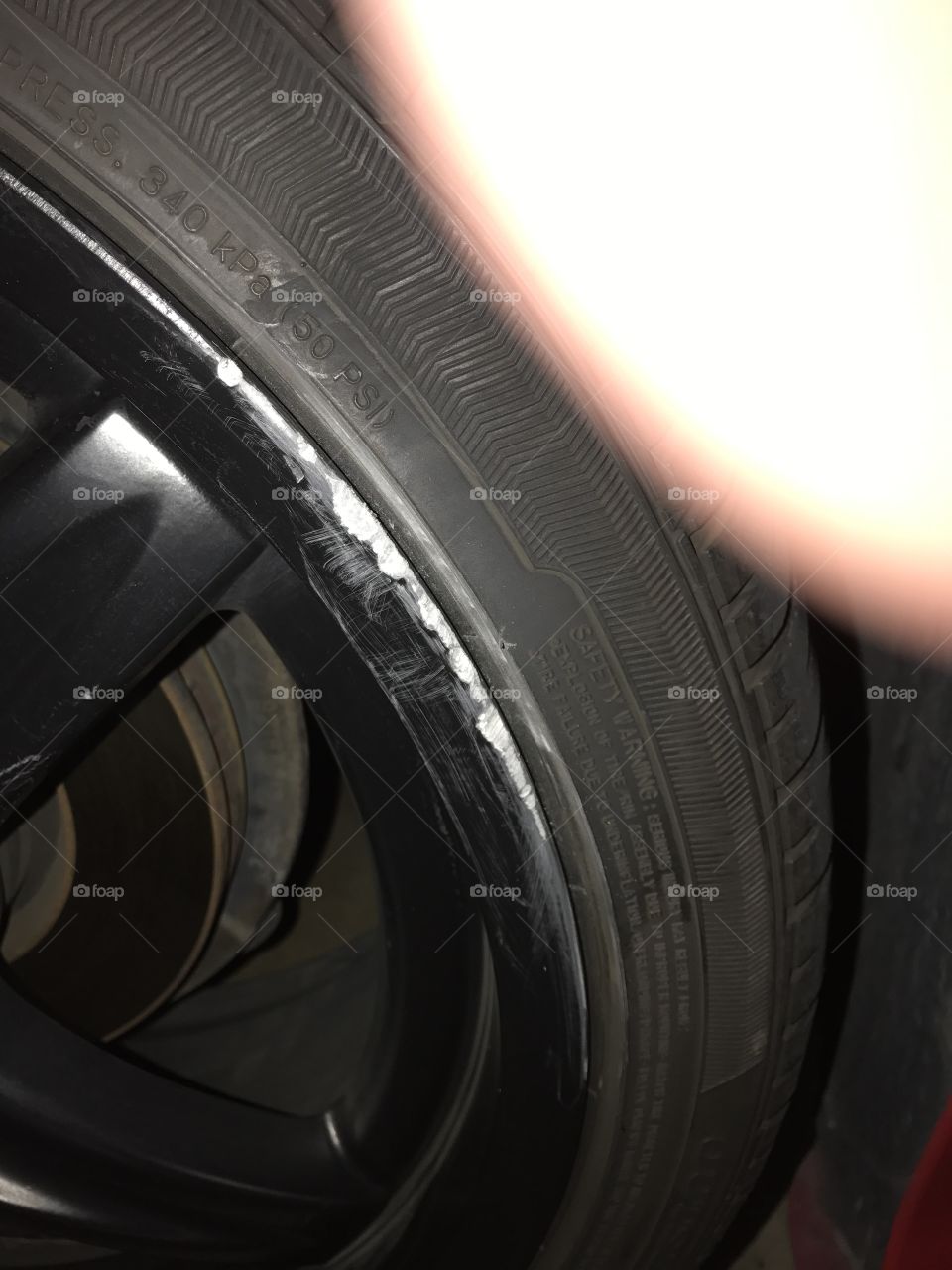Tire rim scraped damaged silver black Woopsie 