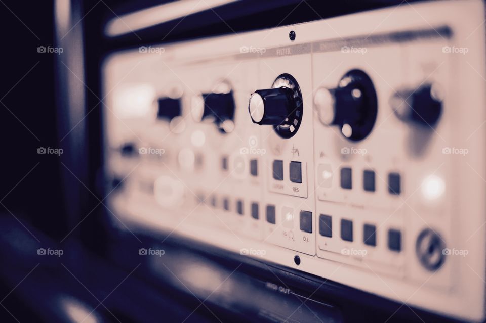 Recording studio equipment . Image of a piece of equipment from a recording studio with deep bokeh.