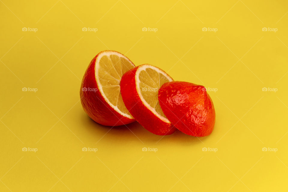 Red lemon sliced. Abstract food concept