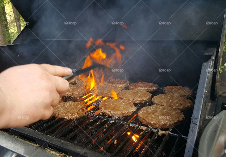 Hamburgers on barbecue grill