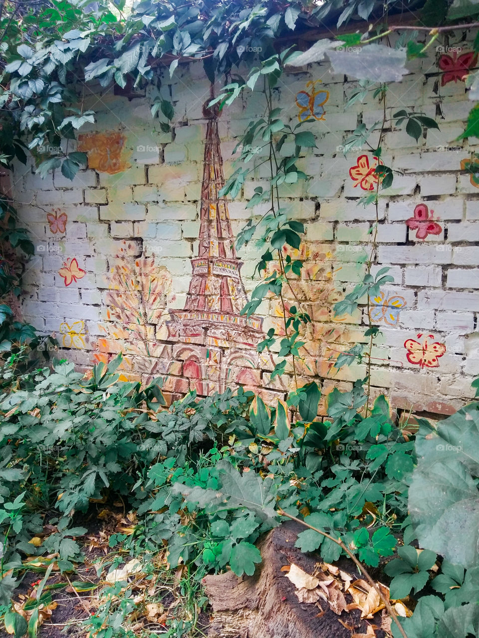 Eiffel Tower Graffiti on a brick wall of a garage