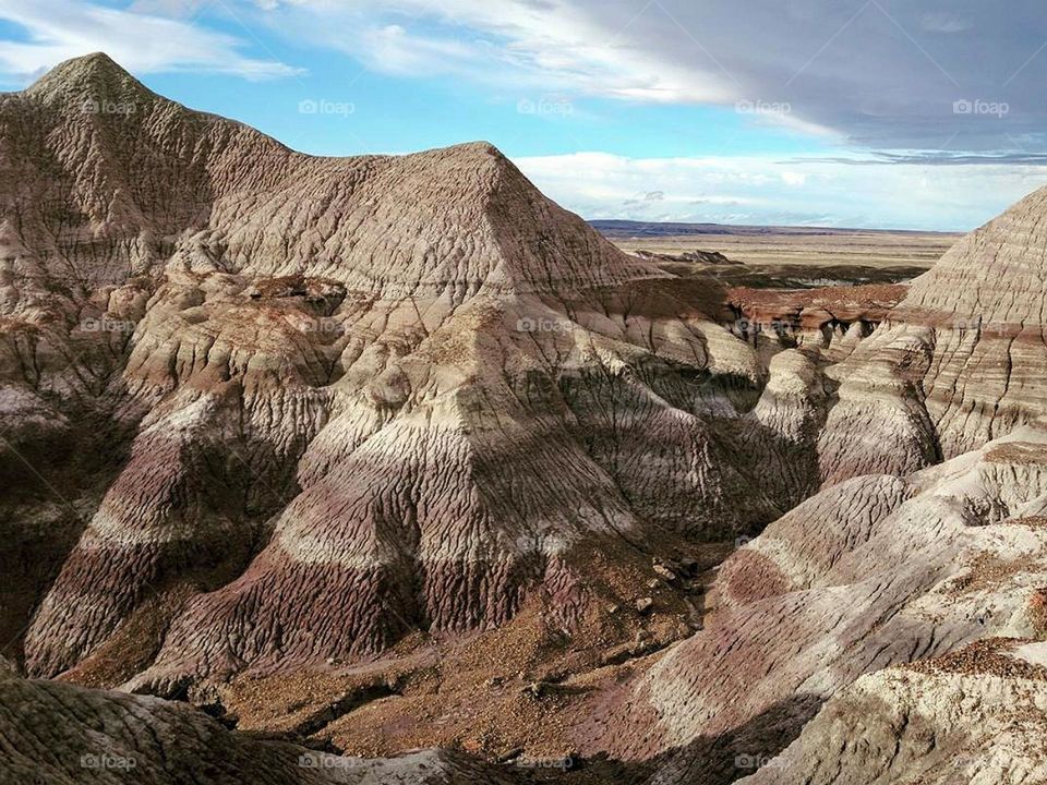 Hiking through Petrified National Park in Arizona.