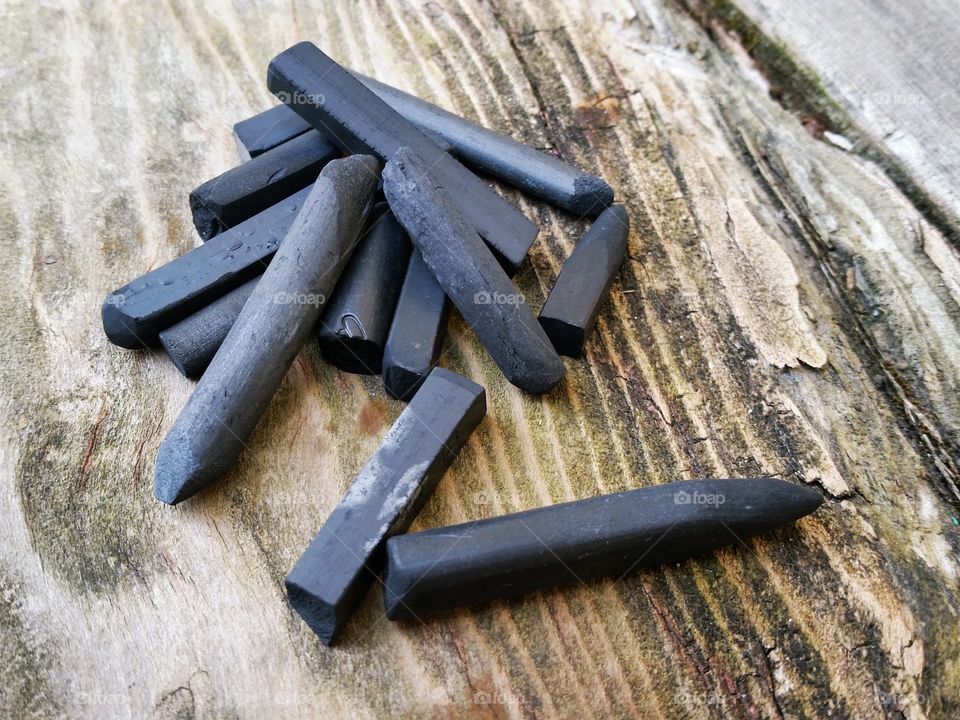 Close-up pile of drawing charcoal in mission