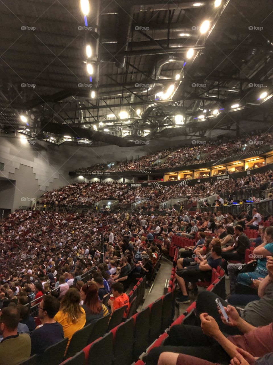 Audience waiting for flight of the concords at Leeds Arena Yorkshire uk