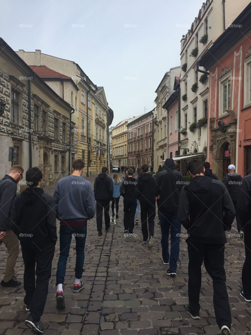 Boys walking European Streets
