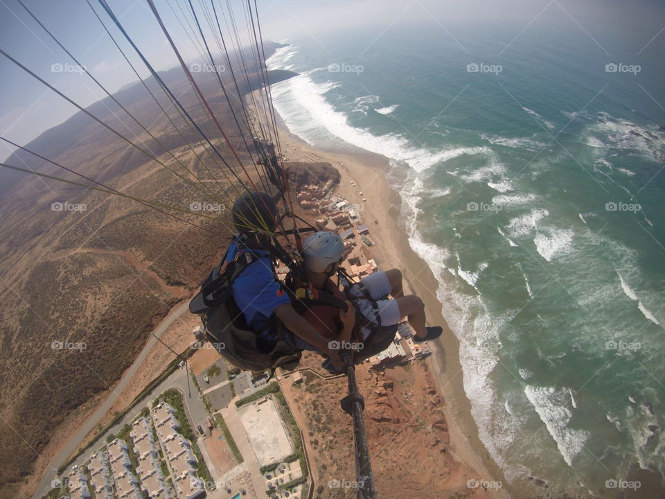 photo taken in Morocco over Legzira beach by Paragliding.
I love to char it with how want to buy it.