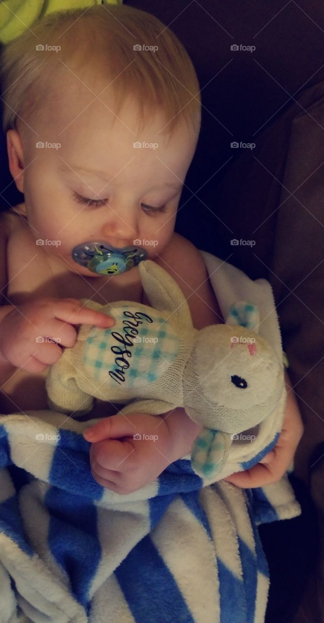 Reading his name on his lamb