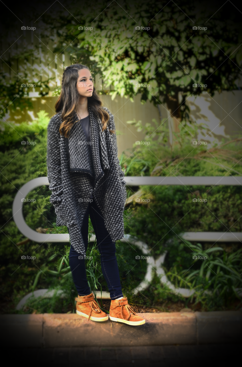 Fashionable young girl standing at outdoors