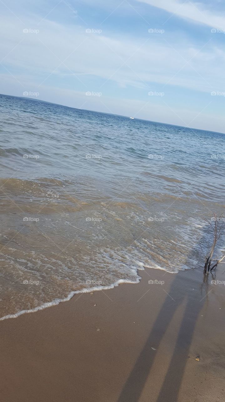 long shado on beach