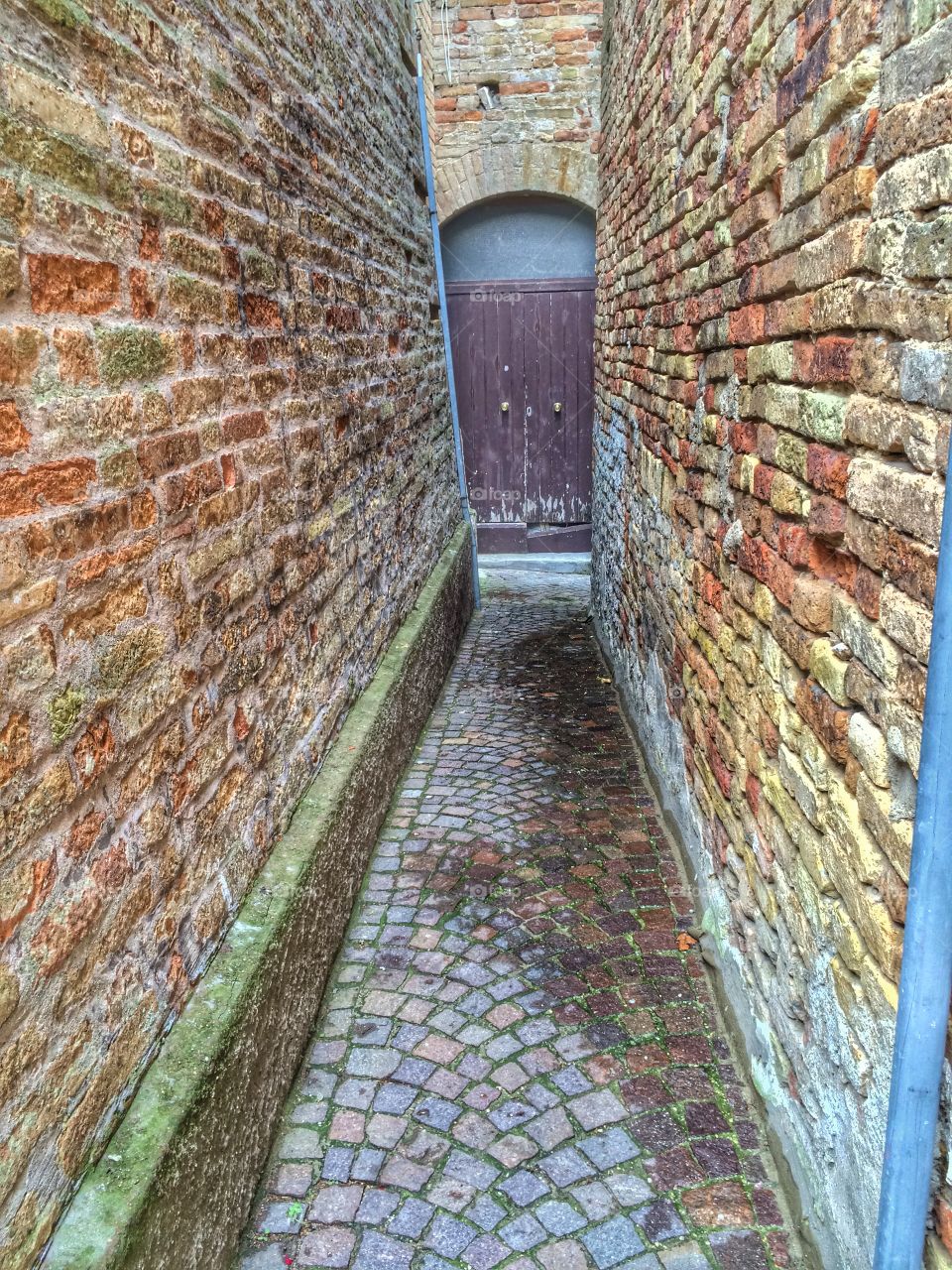 Door at the end of the narrow, Monteprandone, Italy