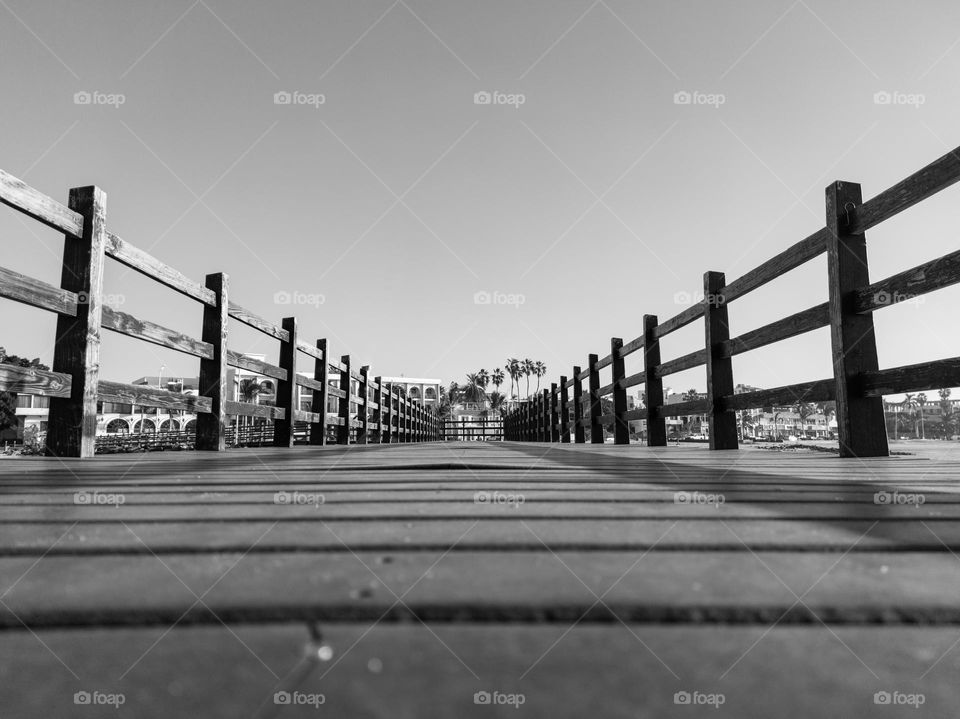 Wooden pedestrian bridge, black and white photo