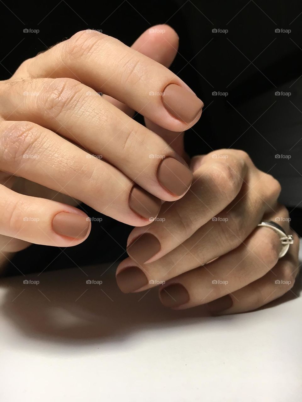 Painted nails, gel polish on nails, women's beautiful and neat manicure