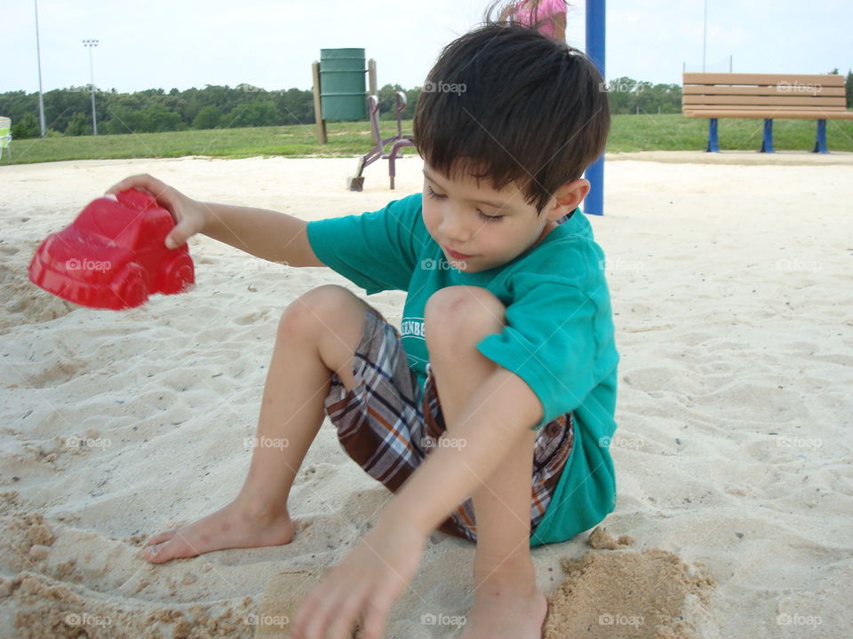 Sand park boy. No beach, no problem. This park has an enormous sand pit.