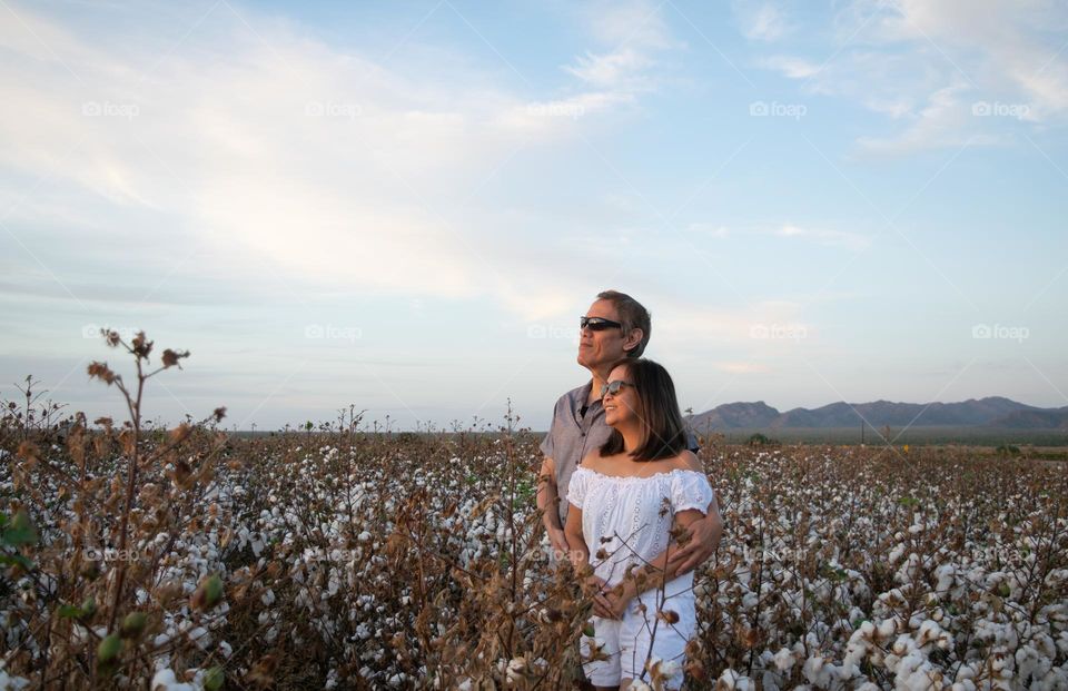 Portrait of a couple in a cotton field 