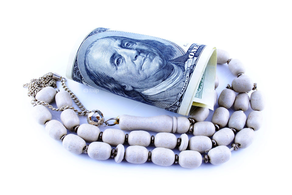 Close up currency of USA with Rosary