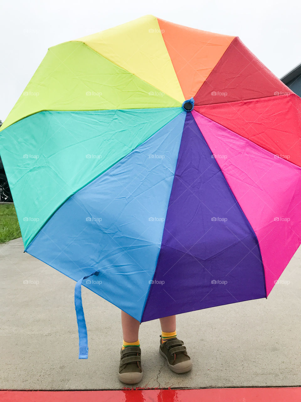 Rainbow umbrella boy