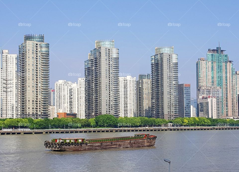 Residential towers beside the Huangpu River, Shanghai, China.