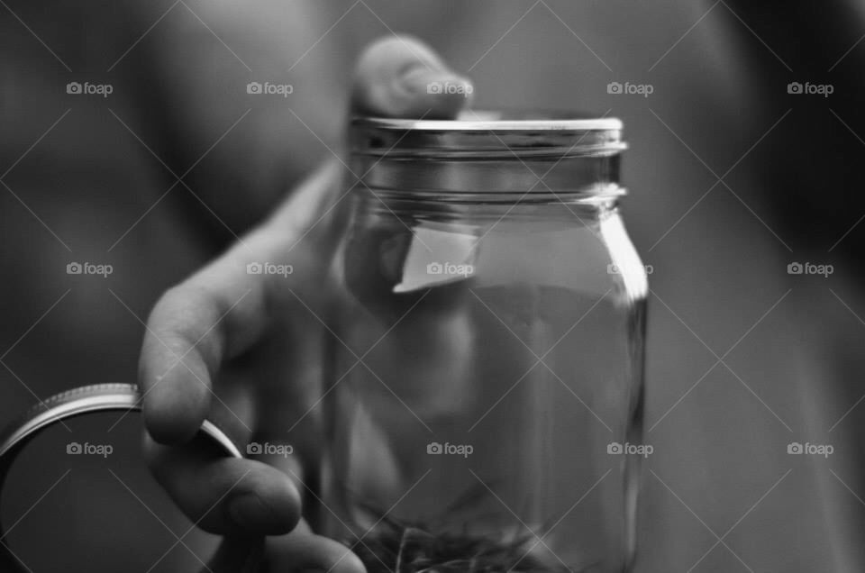 Jar and a hand