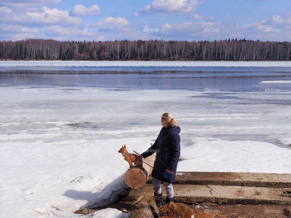 Walking the dog on a frozen lake