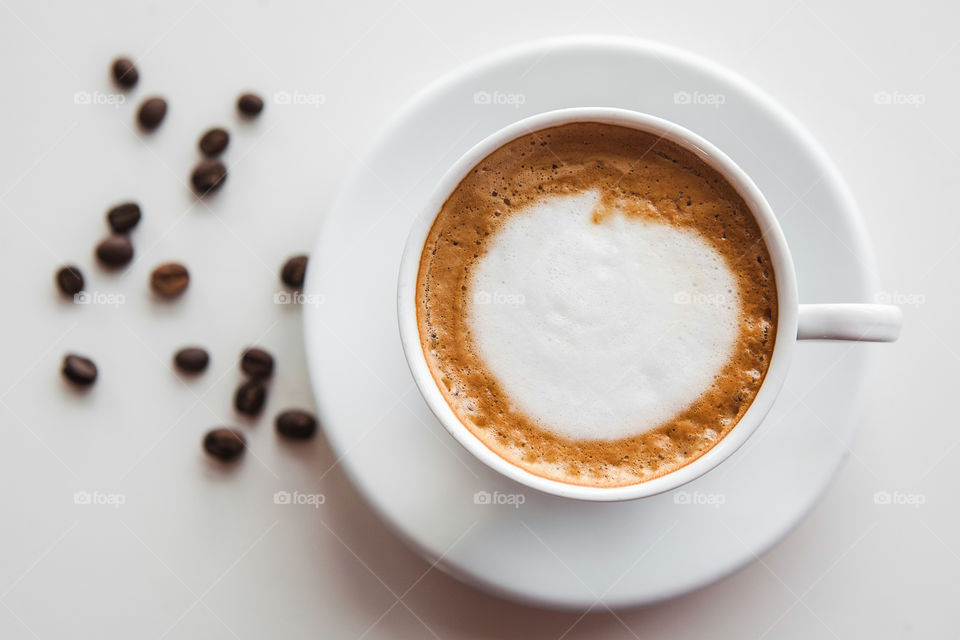 
Coffee cup and coffee bean on white background