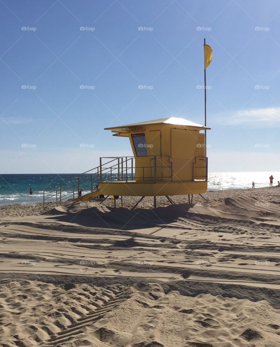 Lifeguard hut on sandy beach