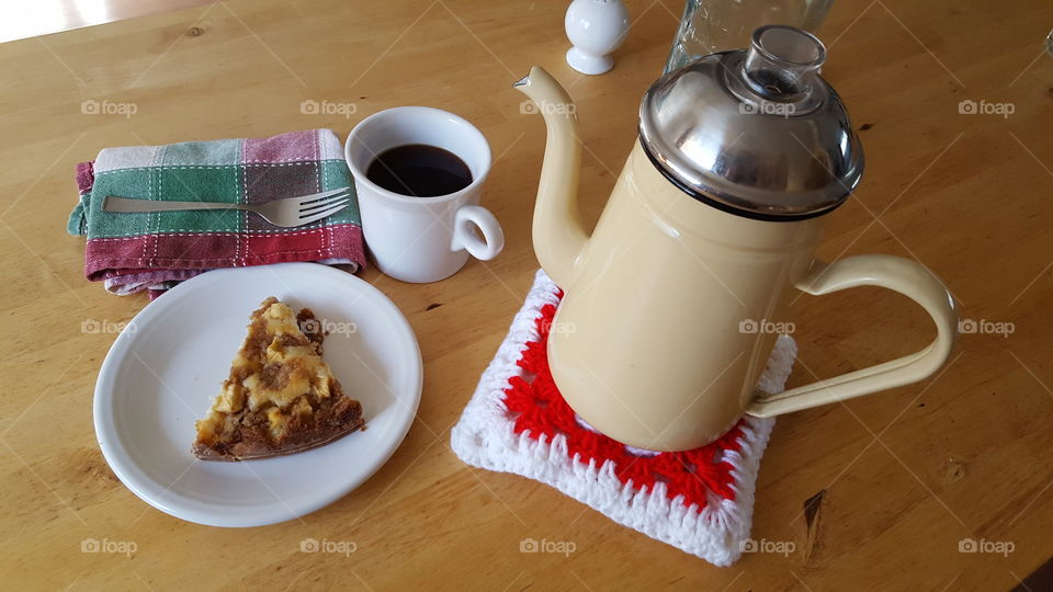 Having a piece of apple cake with voffee. When power is out due to storms coffee is still ready using my old camp coffee maker.