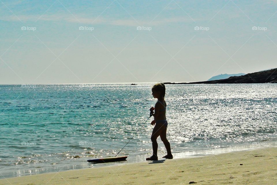 kid at the beach