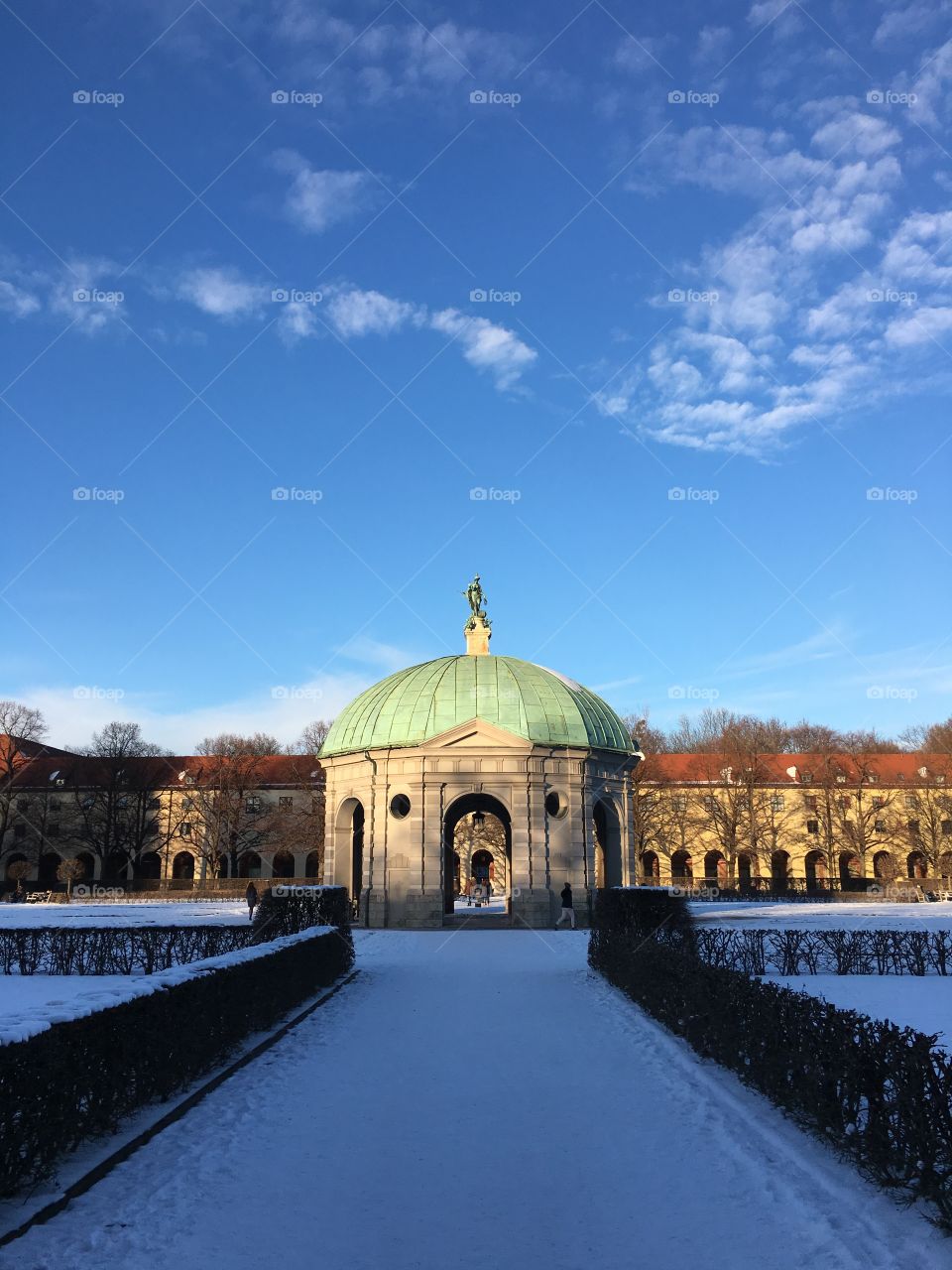 The Colonnade, a central structure in Munich’s Hofgarten, on a snowy afternoon in winter.  