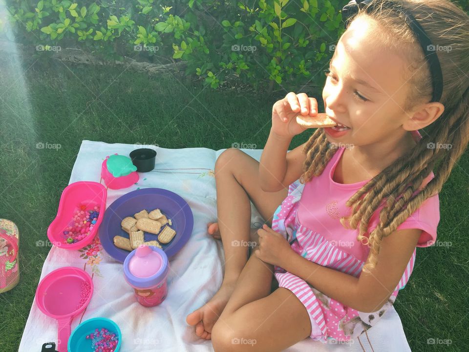 child eating a snack