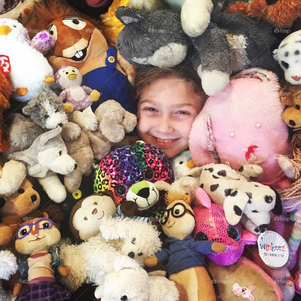 Boy with colorful toys